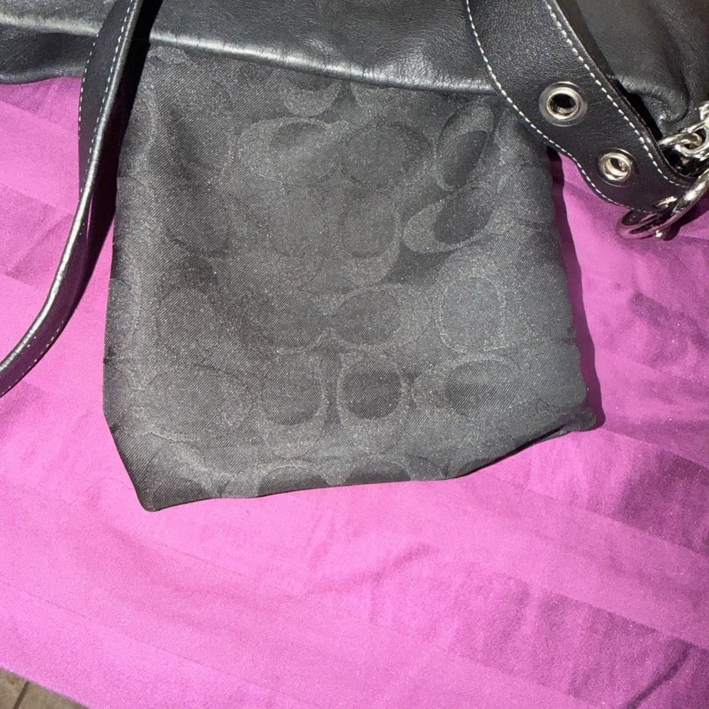 Vintage Coach Legacy 1415 Slim Duffle shoulder Bag in black with white stitching
